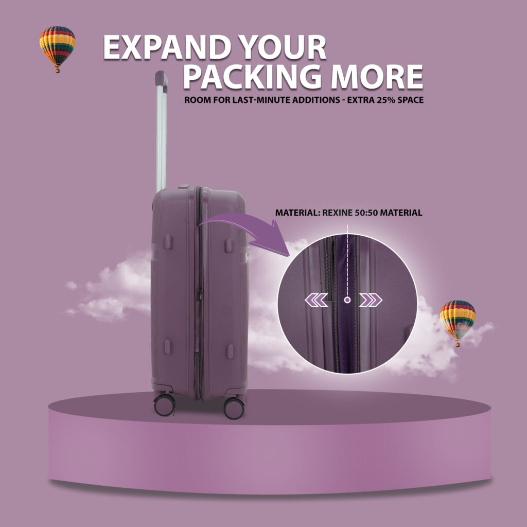 Purple hard suitcase with expandable feature, showing extra 25% packing space and made from 50:50 rexine material, displayed on a round podium with hot air balloons in the background