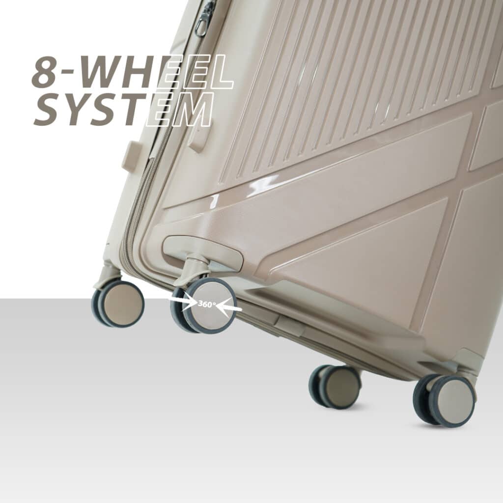 Close-up of American Traveller hard luggage trolley bag showing 8-wheel 360-degree rotating system